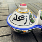 Sammensat keramikskål fra Palæstina til olivenolie og zaatar-krydderiblanding.