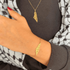 Håndlavet armbånd med digt af Mahmoud Darwish fra Palæstina